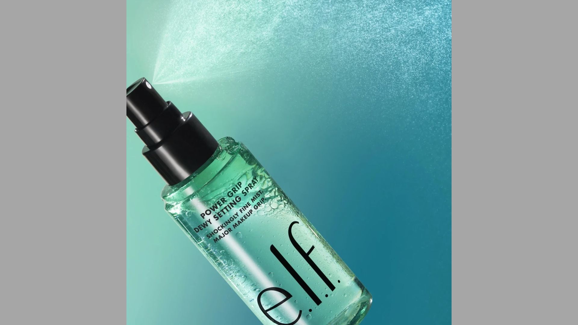A sleek bottle of elf's face mist, ideal for refreshing skin, set on a light surface with a subtle glow.