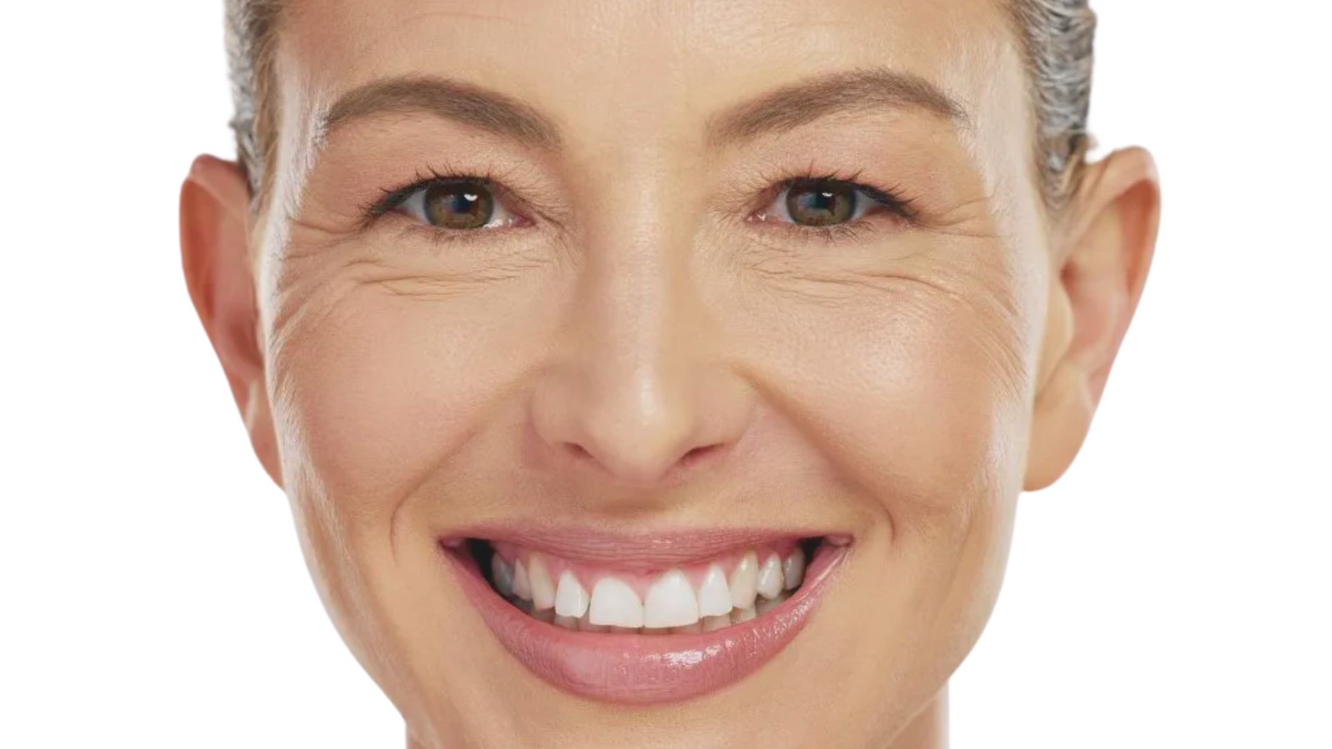 A woman smiling broadly, showcasing her clean and white teeth, exuding confidence and happiness.