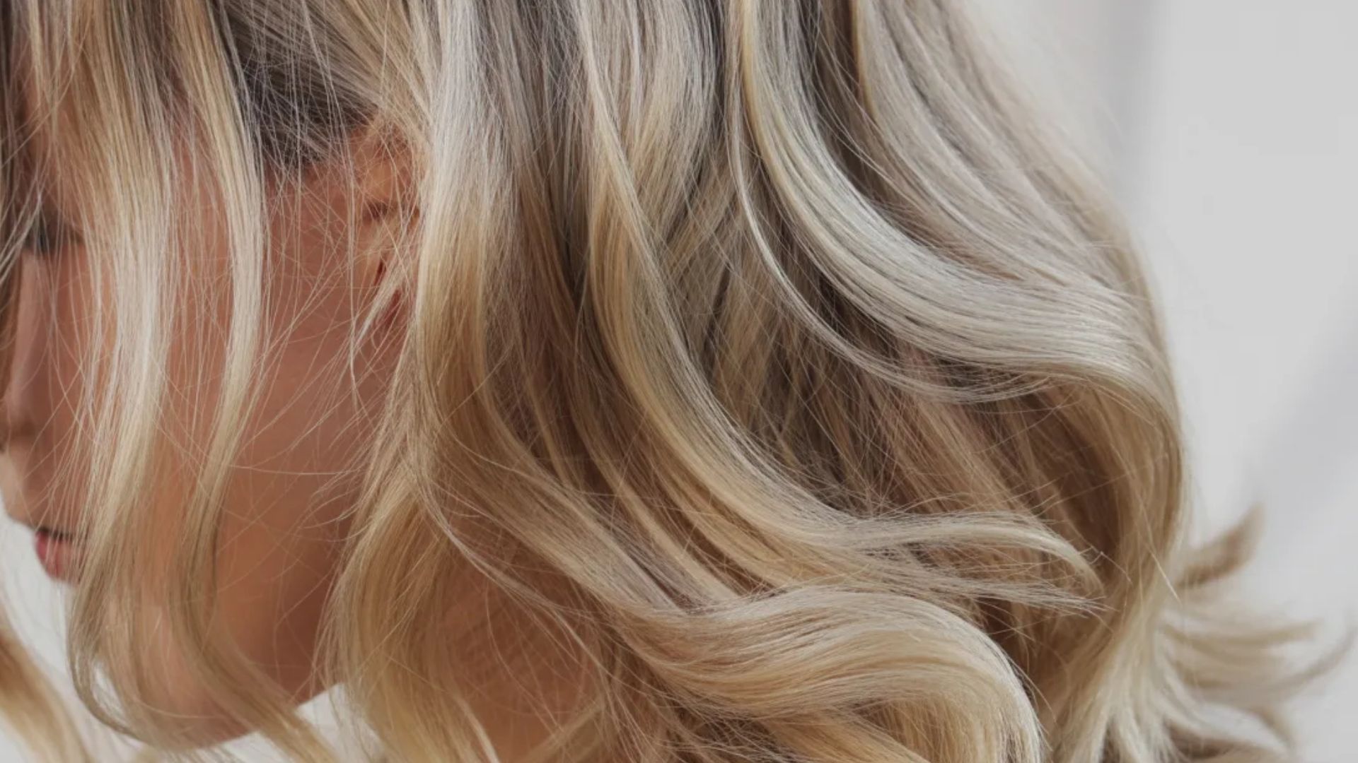 Blonde Transitioning to Grey Hair with Highlights