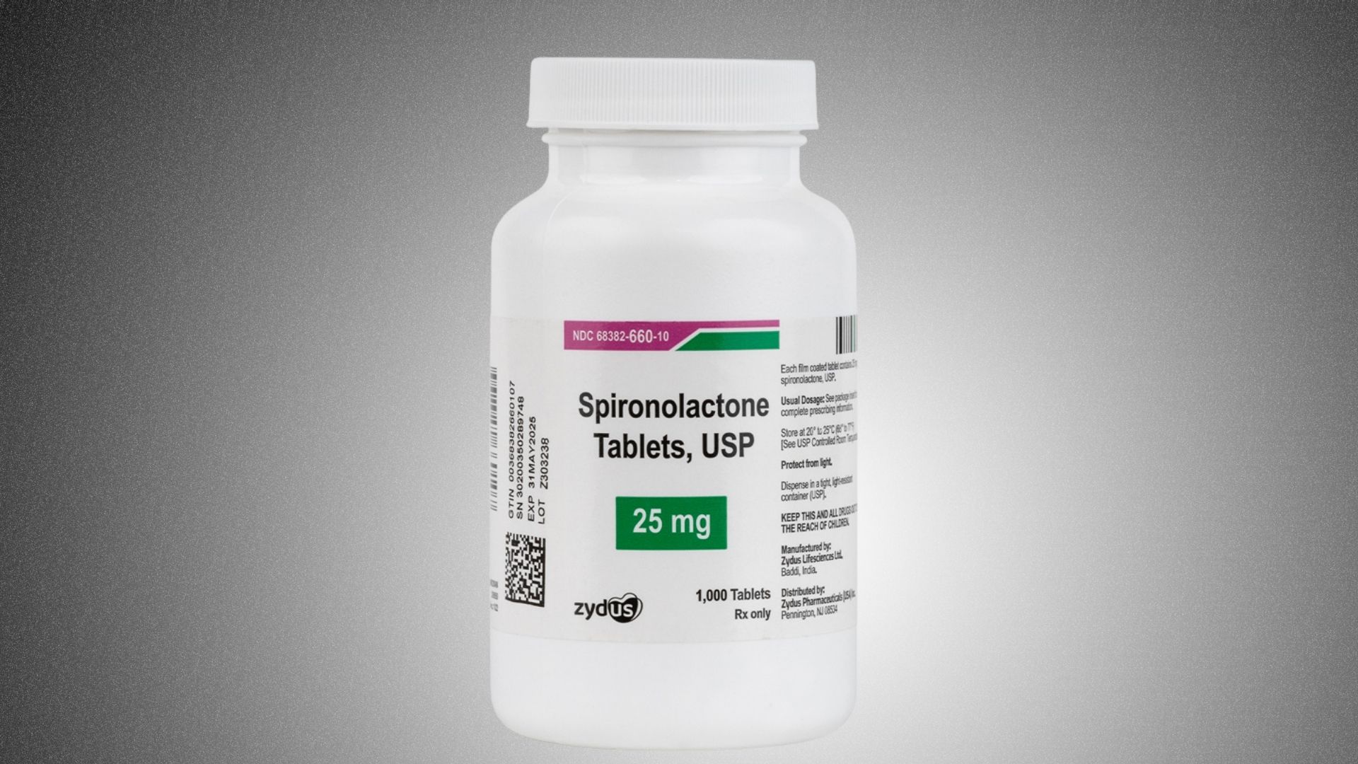 A bottle of spironolactone tablets, labeled with dosage information and a child-resistant cap.