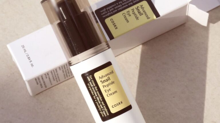 COSRX Blackhead Power Liquid bottle displayed on a table, highlighting its minimalist packaging and product label.