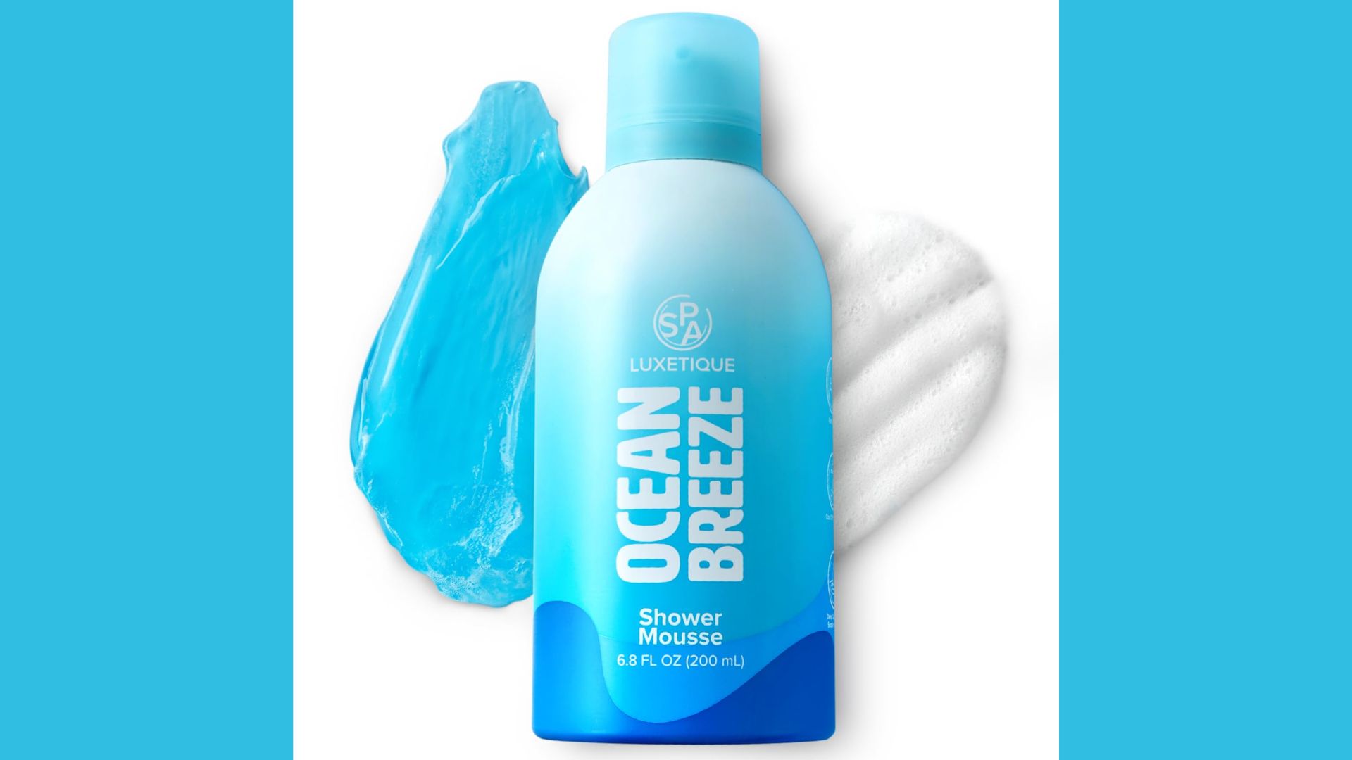 A bottle of ocean breeze spray displayed against a solid blue background.