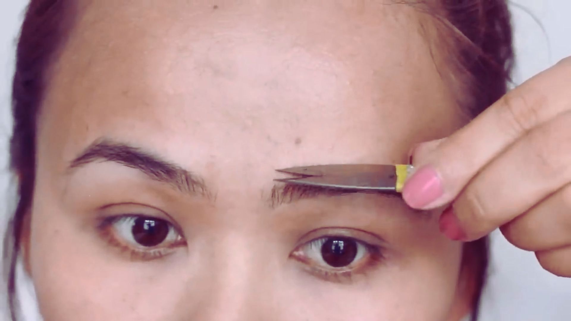 Step-by-step guide on eyebrow threading technique with tools and techniques illustrated for clarity.