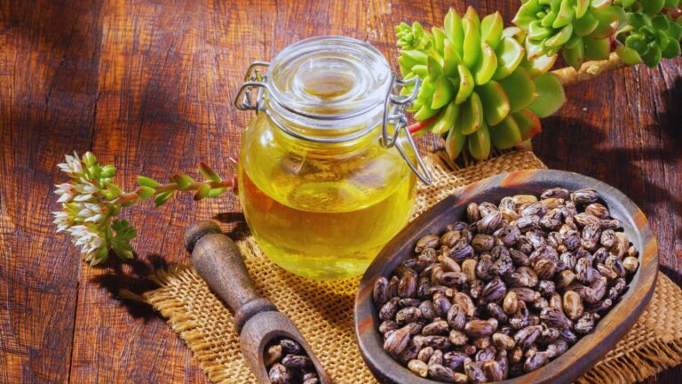 Image illustrating steps to use castor oil for promoting hair growth, featuring application techniques and tips.