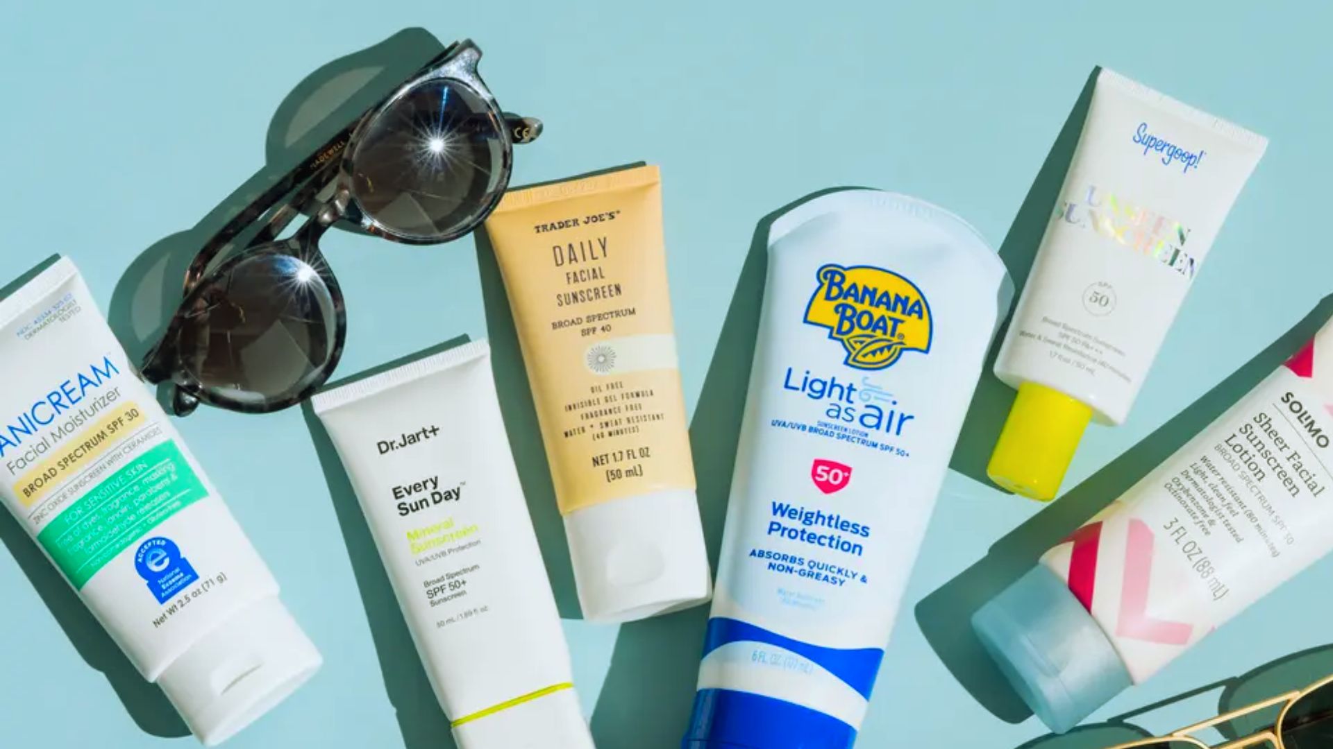 A bottle of sunscreen labeled "Best for Sensitive Skin" with a soft, calming design and natural ingredients highlighted.