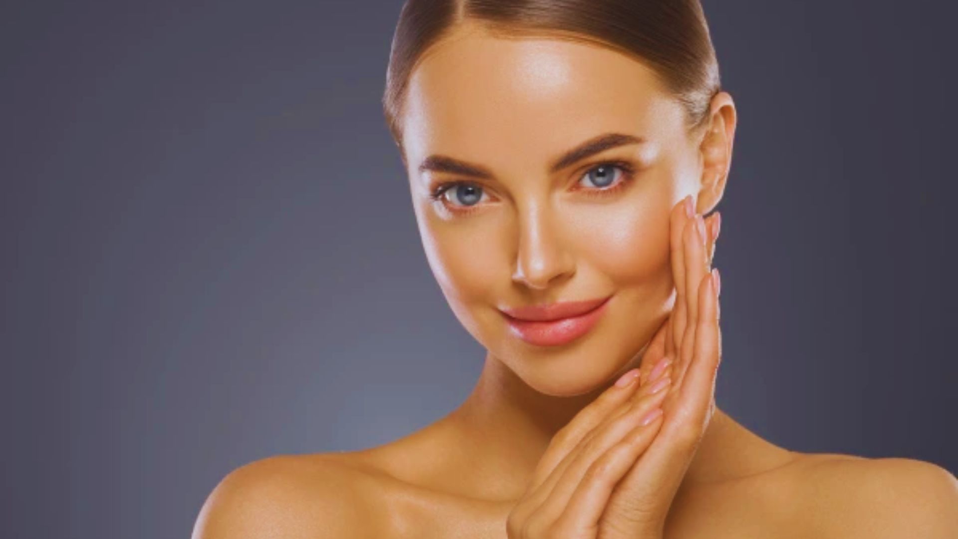 A woman with clear skin and an attractive face, showcasing her natural beauty and confidence.