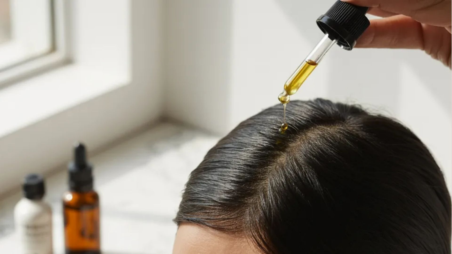 Castor oil scalp massage to support thicker and healthier hair.