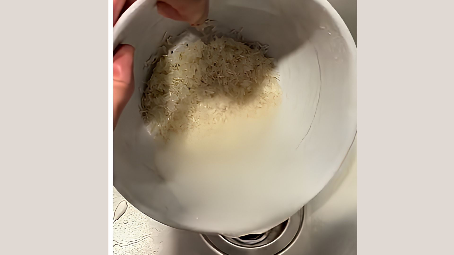 Clean rice soaked in water inside a bowl ready to release nutrients for homemade rice water