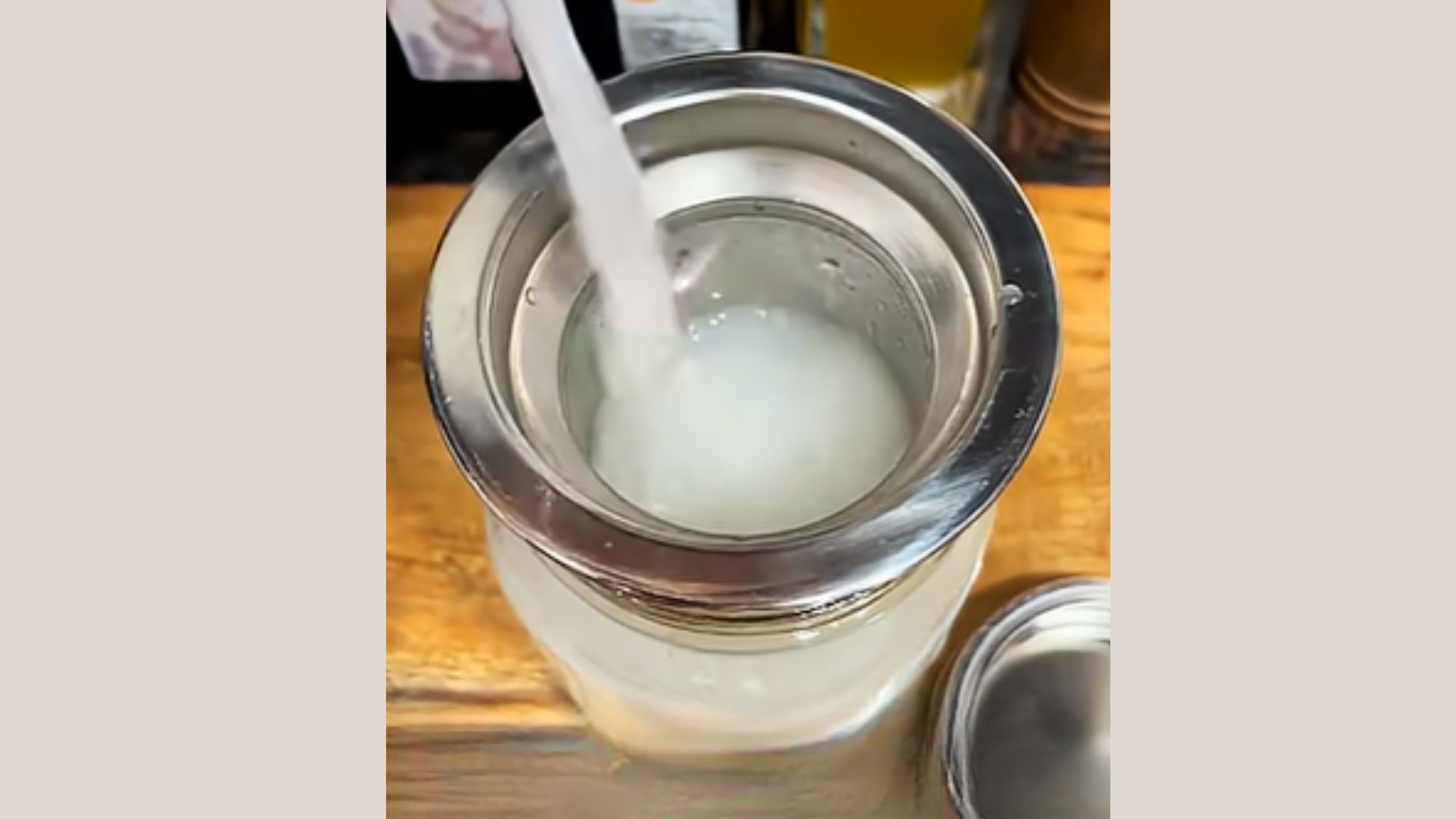 Finished rice water stored in a glass jar ready for hair application and fermentation use