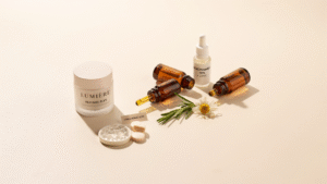 Retinol skincare setup with cream and ingredients like niacinamide hyaluronic acid and ceramides on a clean minimal background.
