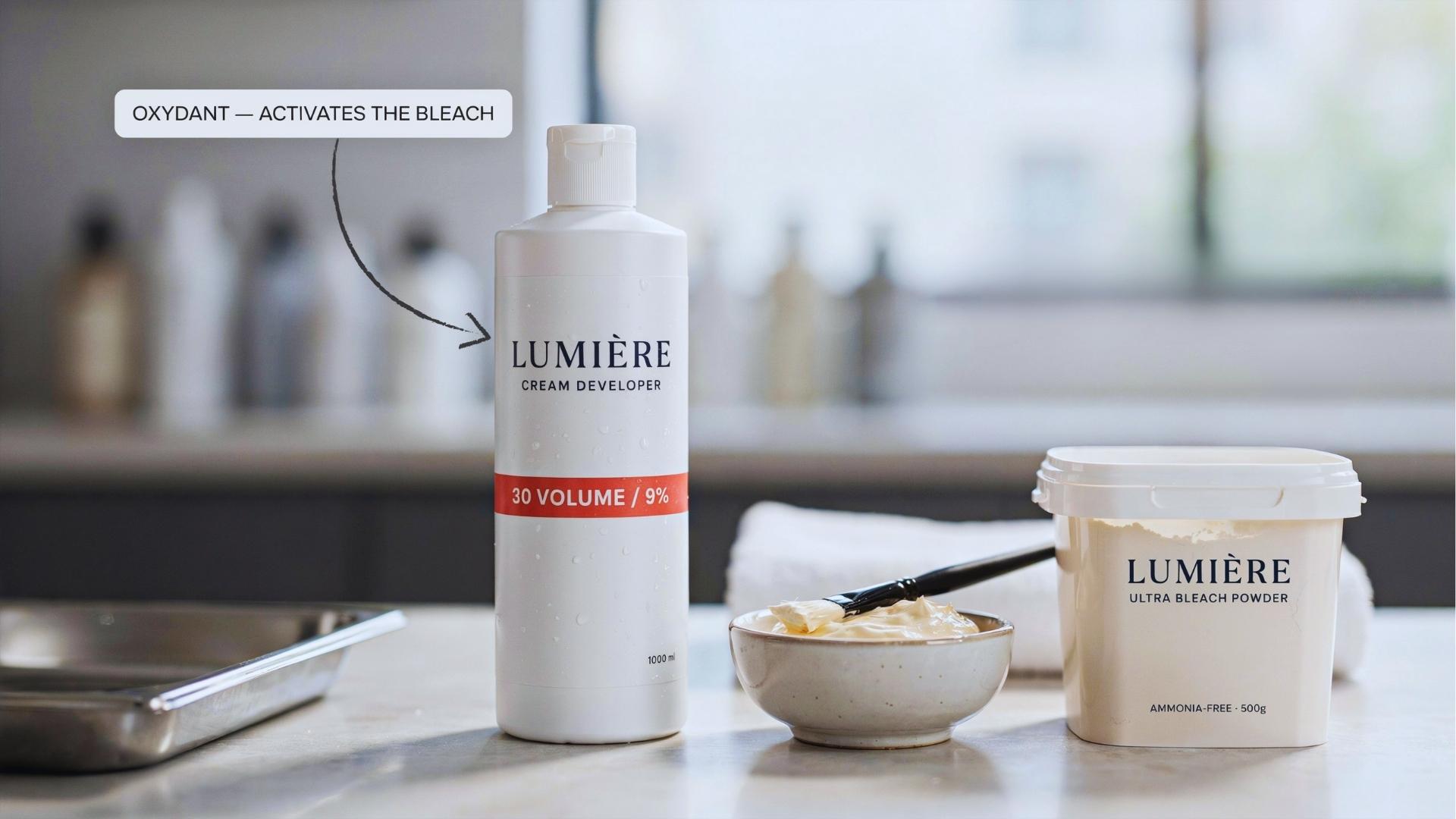 Hair developer and bleach displayed side by side showing their different purposes.