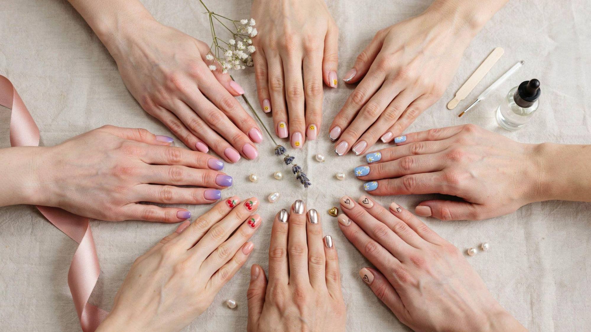 Cute short square nails featuring pastel colors, floral art, French tips, glossy finishes, and trendy minimalist designs.