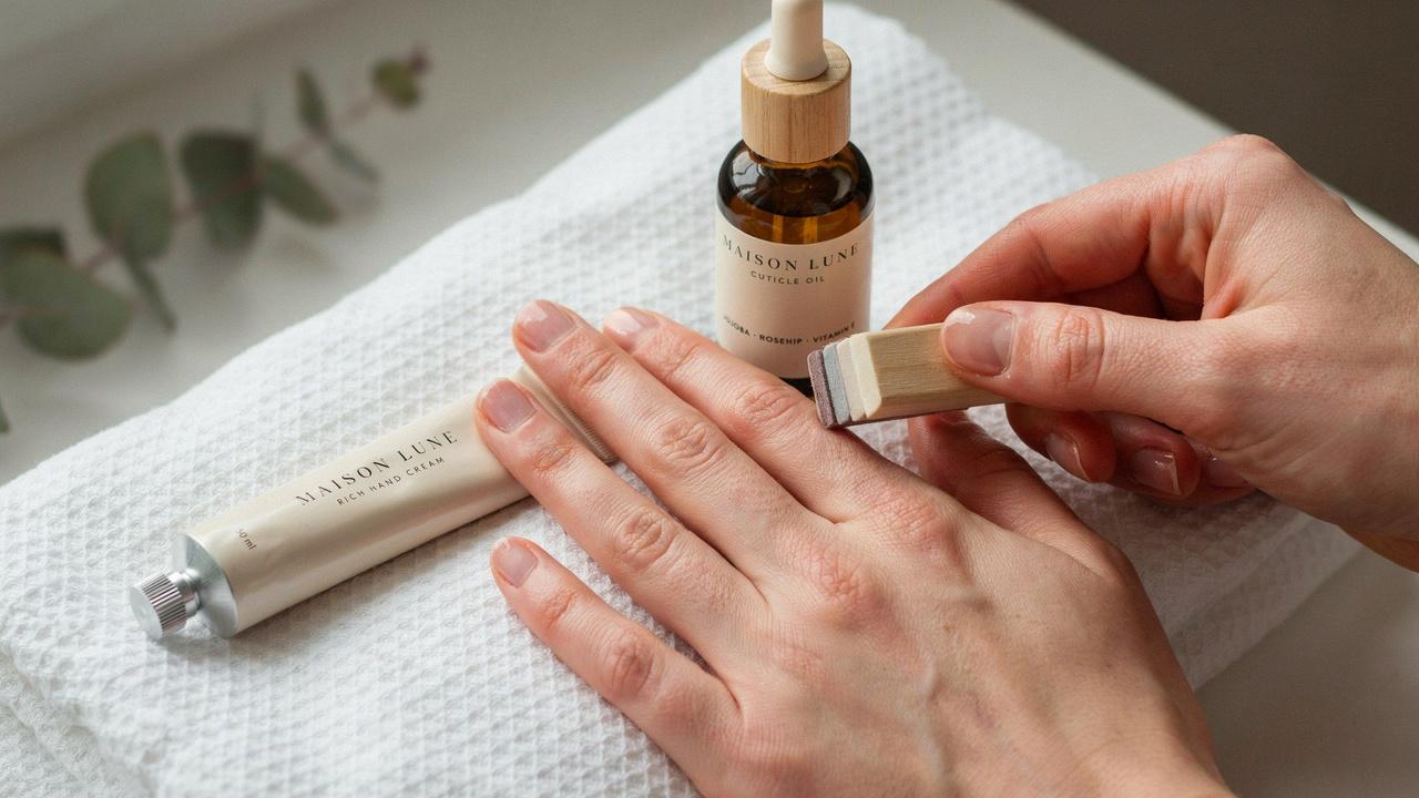 realistic buffing and moisturizing natural nails after acrylic removal in refined style