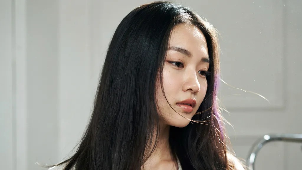 Violet black hair with subtle purple undertones in bright light.