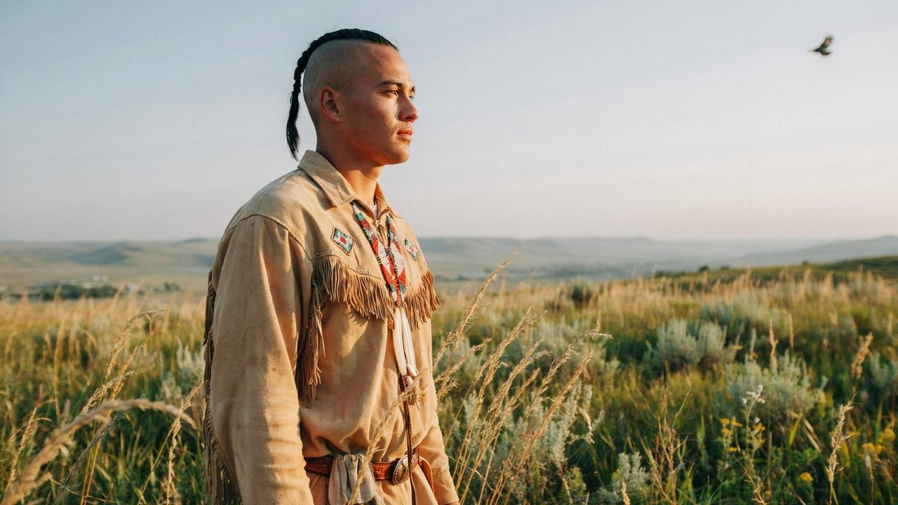 Historical Native American scalp lock hairstyle.