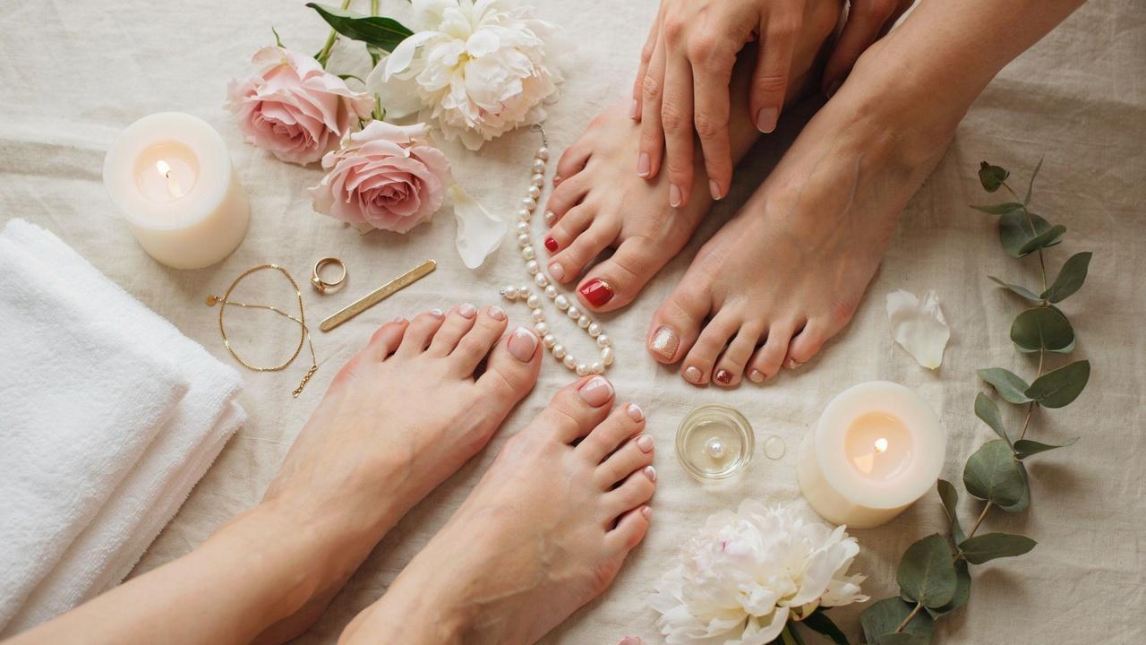 Elegant spa-inspired featured image showcasing beautifully polished pedicures in various classy nail designs.