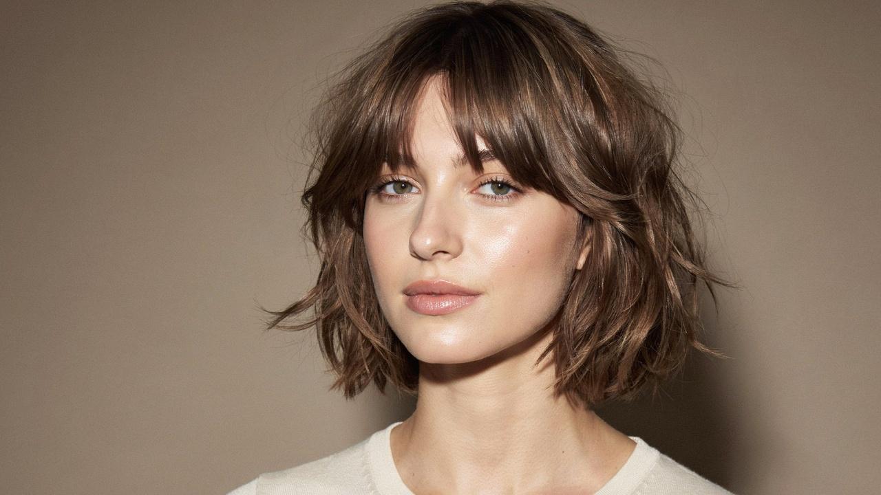 Feathered shaggy bob with airy layers.